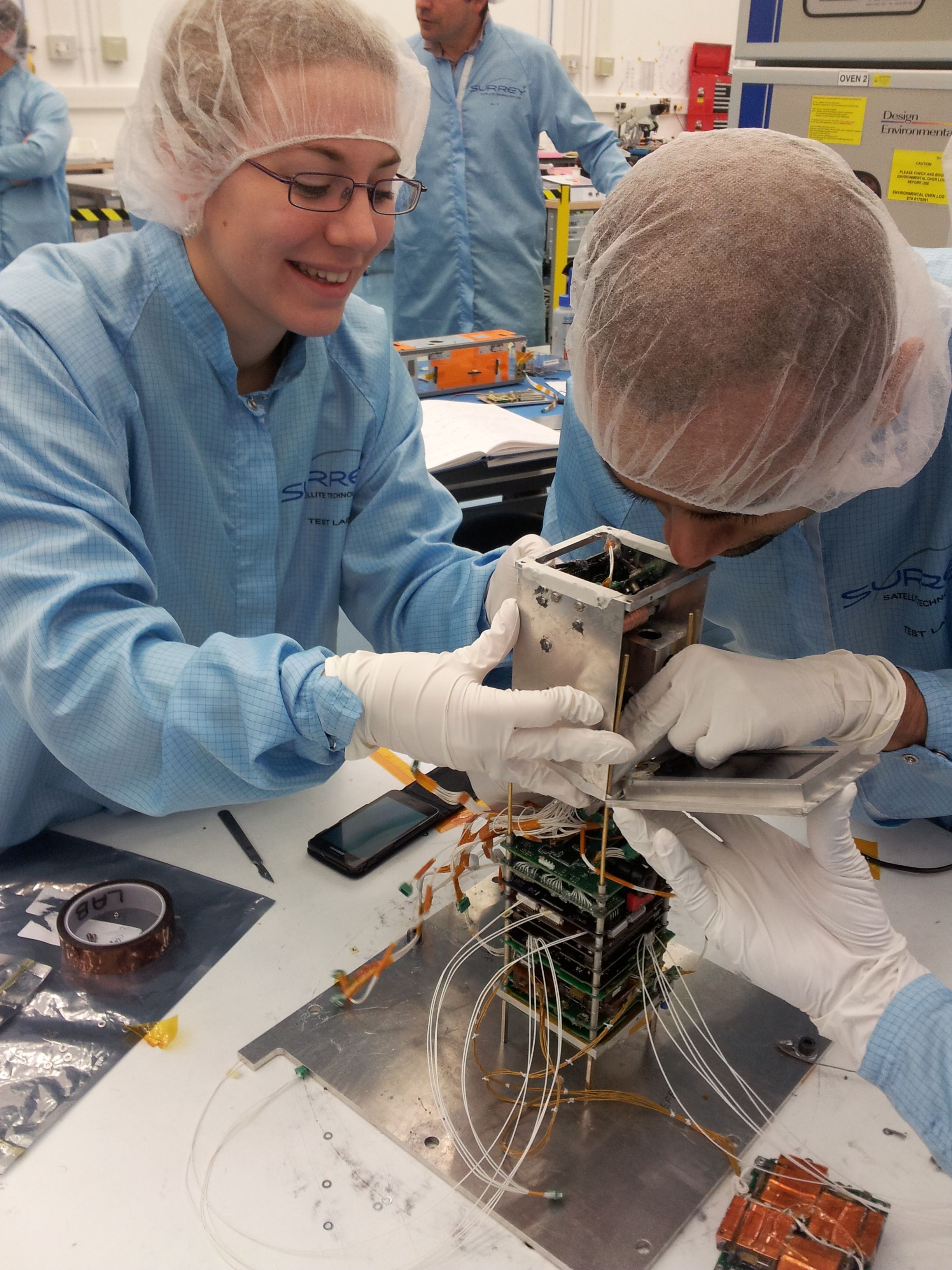 University of Surrey students work on a CubeSat