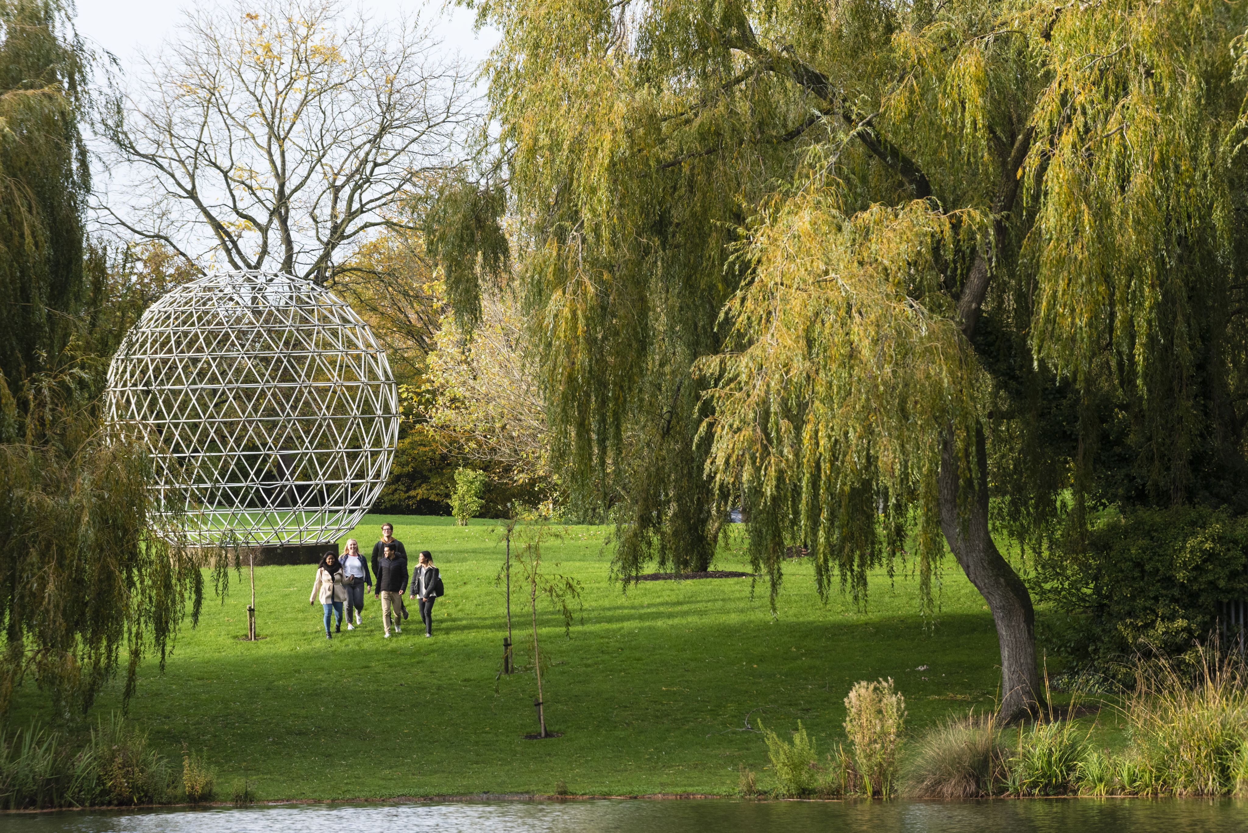 View of the geodesic dome by the lake on Stag Hill campus