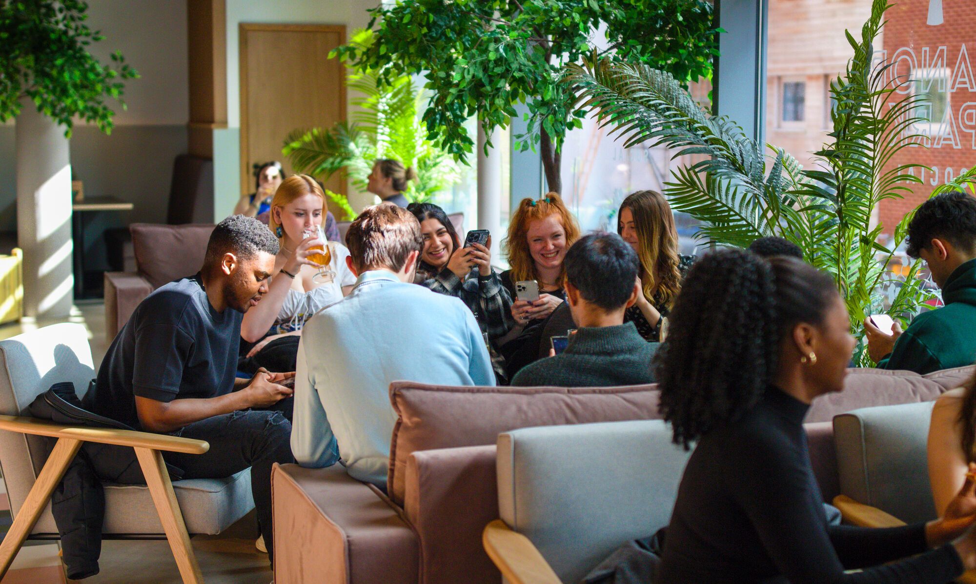 A group of students socialise at Manor Park Social